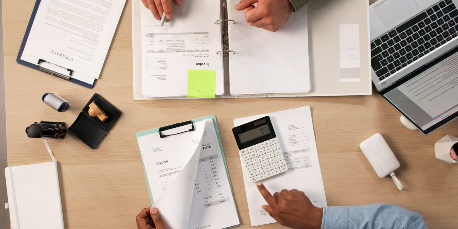 mp70918004-two-accountants-discussing-budget